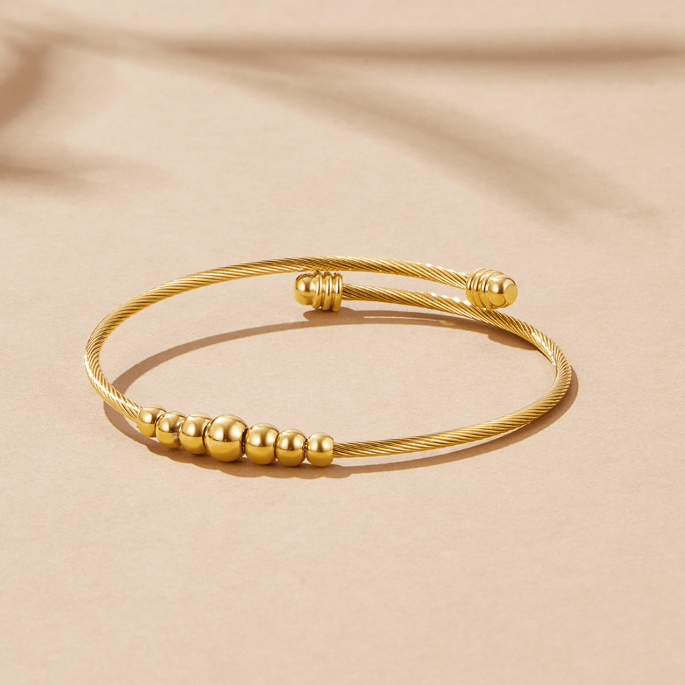 Bracciale decorativo rigido Yuri in oro